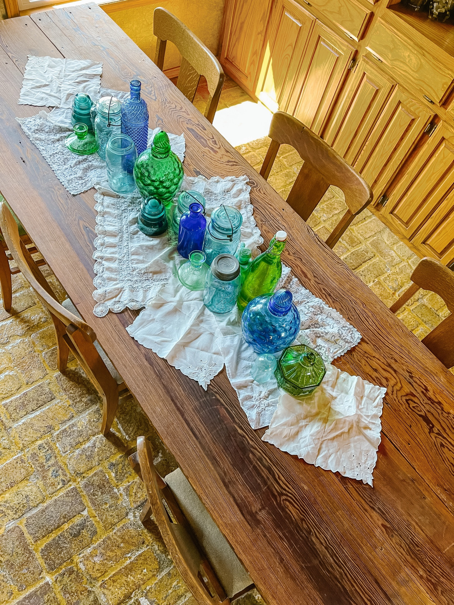 This tablescape will make you think you’ve been to the beach and collected all the sea glass! But it doesn’t have to go on a table. This vignette would look good anywhere! 

#LTKhome #LTKSeasonal
