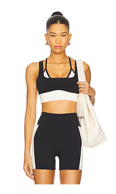 LSPACE Full Force Sports Bra in Black & Cream from Revolve.com | Revolve Clothing (Global)