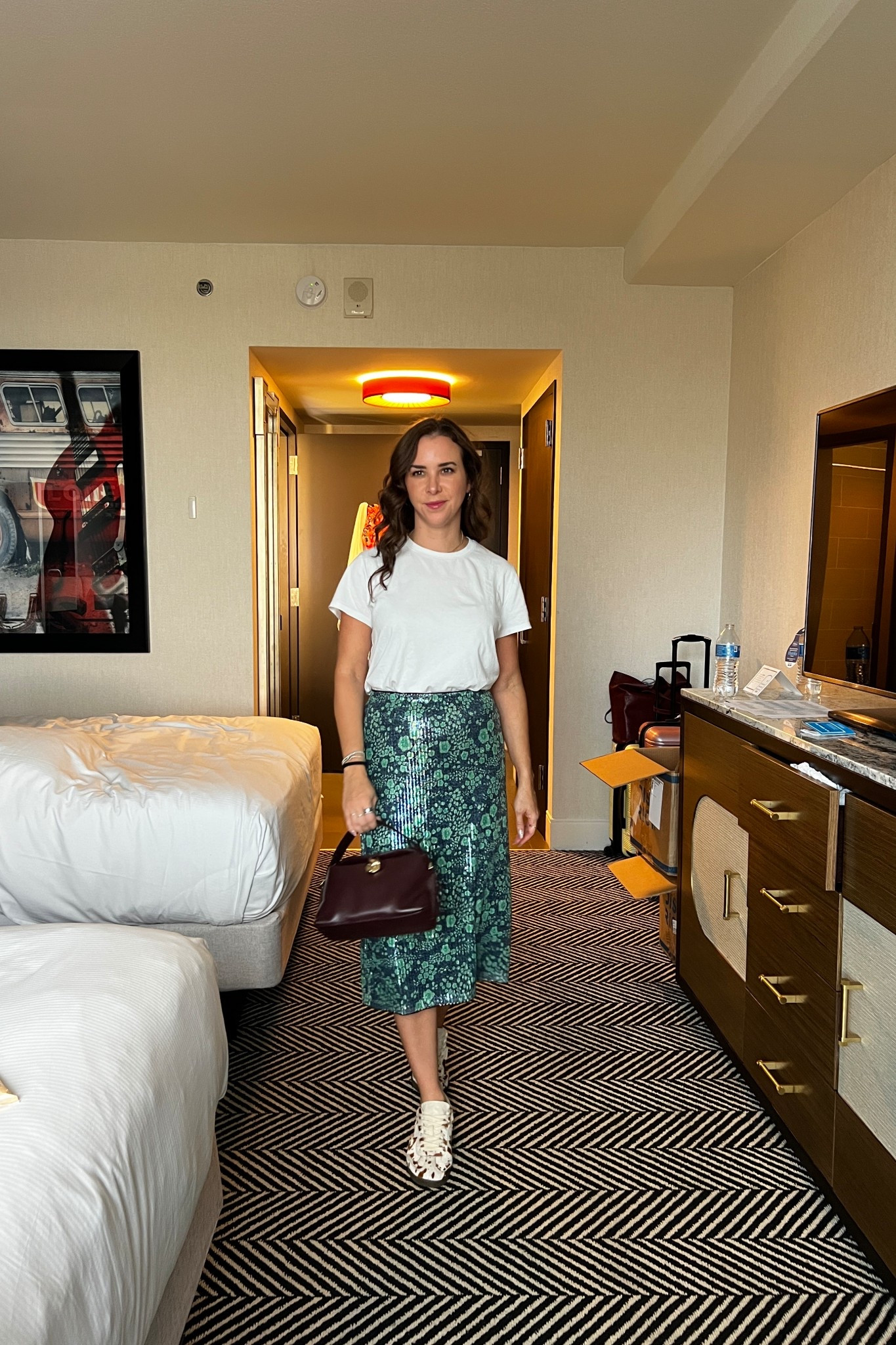 Sequin skirt. Casual sequins. White tee. The best white tee. Burgundy purse. Flattered purse. Cow print sneakers.

#LTKSaleAlert #LTKootd