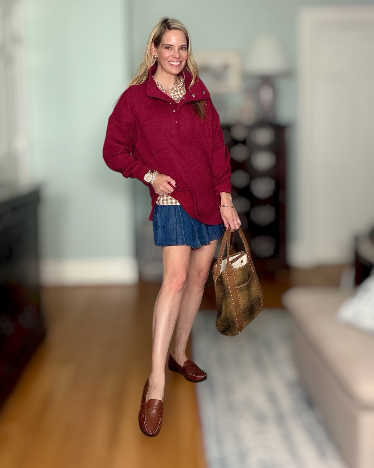 Burgundy + Denim: The Ultimate Preppy Fall Transition Look 🍷💙

This is my kind of fall transition outfit! 🍂✨ A rich burgundy pullover layered over a classic gingham button-down, paired with a pleated denim mini skirt and brown loafers. Add the plaid tote and you have the perfect preppy finishing touch! 🤎👜

I love how the burgundy instantly makes this look feel like fall while the denim skirt keeps it fun and easy for those in-between-weather days. Perfect for school drop-off, casual lunches, football weekends, or a day of shopping! 🍁🏈

Preppy fall outfit, fall transition outfit, burgundy pullover, denim pleated skirt, gingham shirt, brown loafers, plaid tote bag, classic preppy style, women’s fall fashion, casual fall outfit, preppy style over 40, fall outfit inspiration.

#LTKOver40 #LTKSeasonal #LTKootd