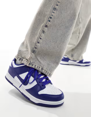 Nike Dunk Low Retro sneakers in white and blue | ASOS (Global)
