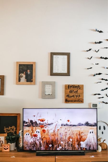 add a little touch of spooky to your home with these beautiful halloween artwork screensavers for your smart TV and subtle modern decor with these 3D plastic bat stickers on the wall

#LTKhome #LTKHalloween #LTKSeasonal