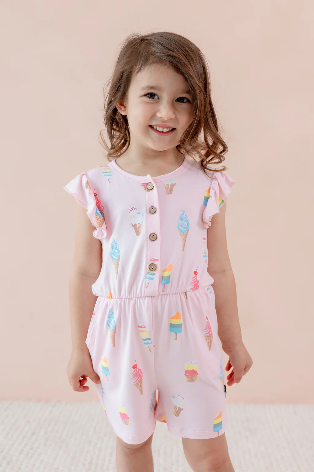 Flutter Sleeve Romper in Sakura Ice Cream | Kyte Baby