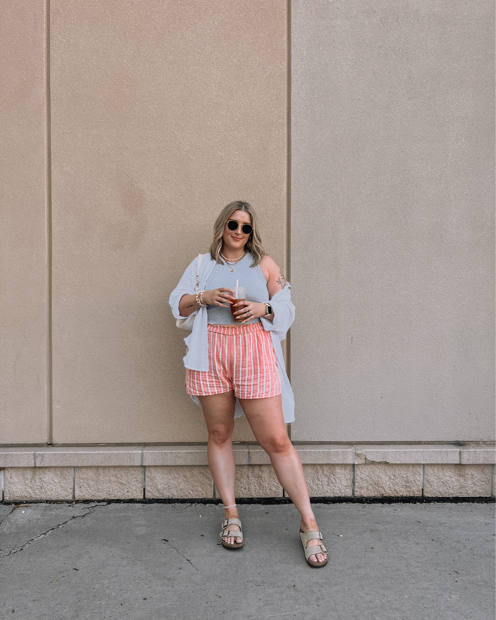 Casual midsize summer outfit - pink linen striped boxer shorts (L), basic grey tank top (L), gauzy white button up (linked this year’s version), Birkenstock Arizona sandals (so comfy and tts) 

#LTKsummer #LTKmidsize #LTKcanada