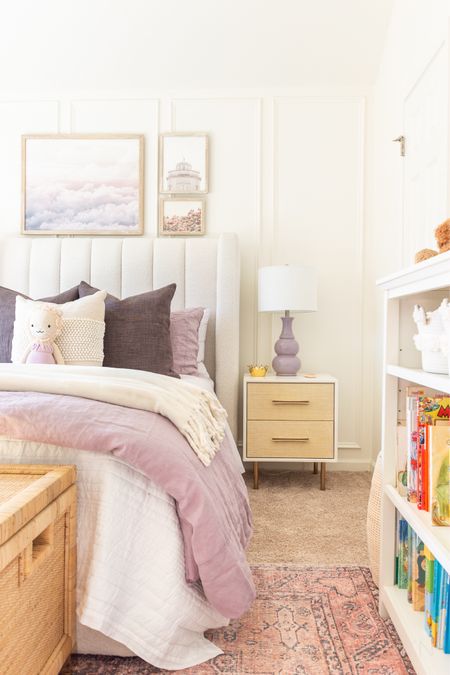 Eliza’s big girl bedroom is finally finished and she could not be more thrilled! purple bedroom pink bedroom rattan trunk purple lamp bookshelf two drawer nightstand purple wall art white bedding

#LTKstyletip #LTKhome #LTKkids
