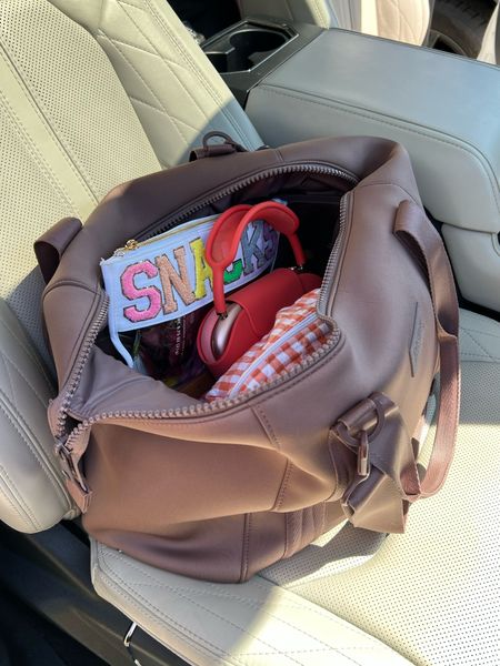 Road-trip faves! Use BRE20 for 20% off my dagne Dover bag!! Size M color Dune! Toddler snack pouch + love these headphones + fave makeup storage bags 

#LTKunder100 #LTKtravel #LTKfamily