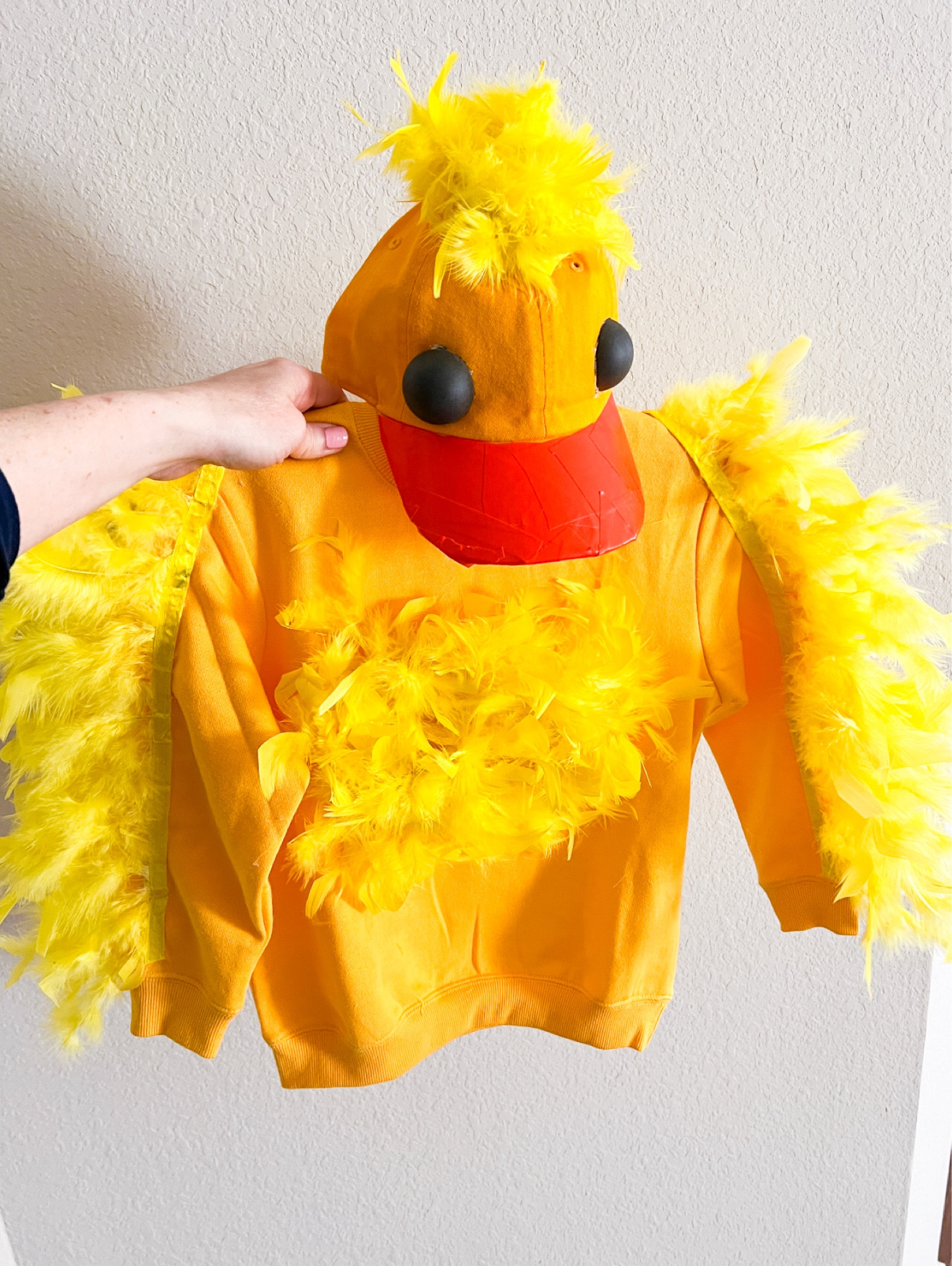 DIY duck costume for kids

I hot glued feathers along the arms of a yellow sweatshirt and in the middle. 

Also used yellow sweatpants and orange shoes. 

Yellow baseball cap - glue some feathers on top ; I cut a black ping pong ball in half and glued on the hat; orange duct tape on the brim

Easy to make duck costume is great for school plays or for a Halloween costume for kids. 



Duck costume, Halloween costume, kids costume , diy Halloween costume , amazon finds 

#LTKunder50 #LTKkids