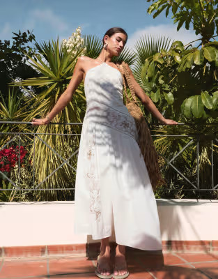 ASOS DESIGN halter tonal spliced maxi dress with asymmetric panels in ivory | ASOS (Global)