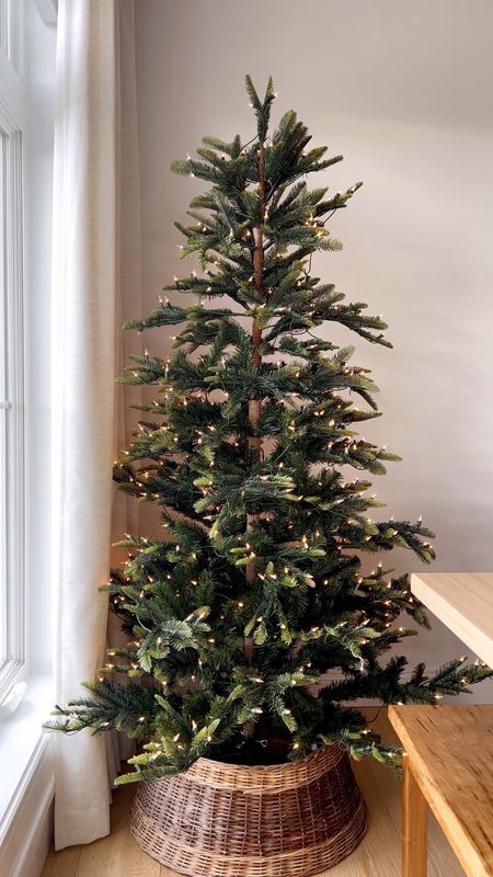 Realistic Real Touch Faux Christmas Tree Pre-Lit | 4 pieces and super easy to put together! Under $200 

This is the SLIM there is a STANDARD width listed below as well. 

#LTKhome #LTKHoliday #LTKSeasonal