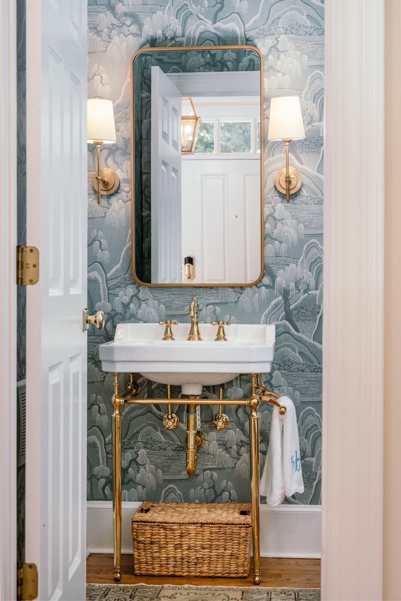This 90s powder room was given a major glow up. Everything was updated from the pedestal sink to the mirror, sconces, and the game changing wallpaper. Since this room is located at the front entry of the home and is primarily a space for guests, the upgrade to this tiny room makes a huge impact in this house! 

Check out all of our sources below. ⬇️

#LTKFind #LTKSeasonal #LTKfamily