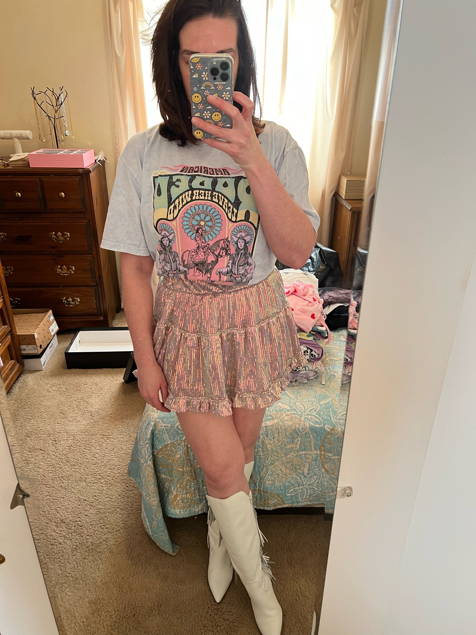 Country Concert Outfit - Rodeo graphic t-shirt (size small). Pink sequin mini skirt (size small). White fringe boots (size 8.5). Bralette (size medium). #countryconcert #countryconcertoutfit #graphictee #tee #tshirt #graphictshirt #skirt #miniskirt #pinkskirt #sequinskirt #boots #fringeboots #whiteboots #whitefringeboots #bralette 

#LTKSeasonal #LTKStyleTip #LTKFindsUnder100