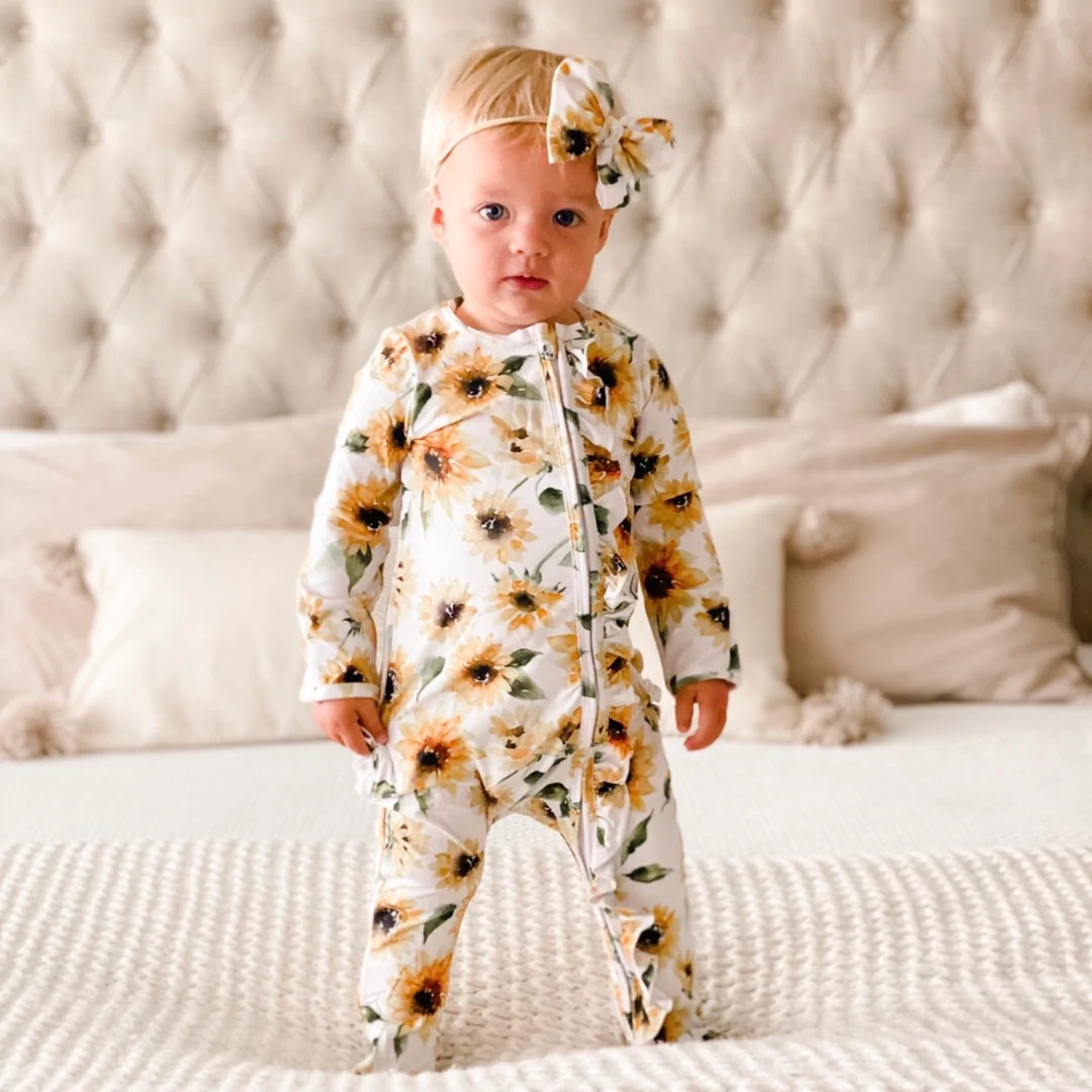 Savannah's Sunflower Zipper Ruffle Footie | Caden Lane