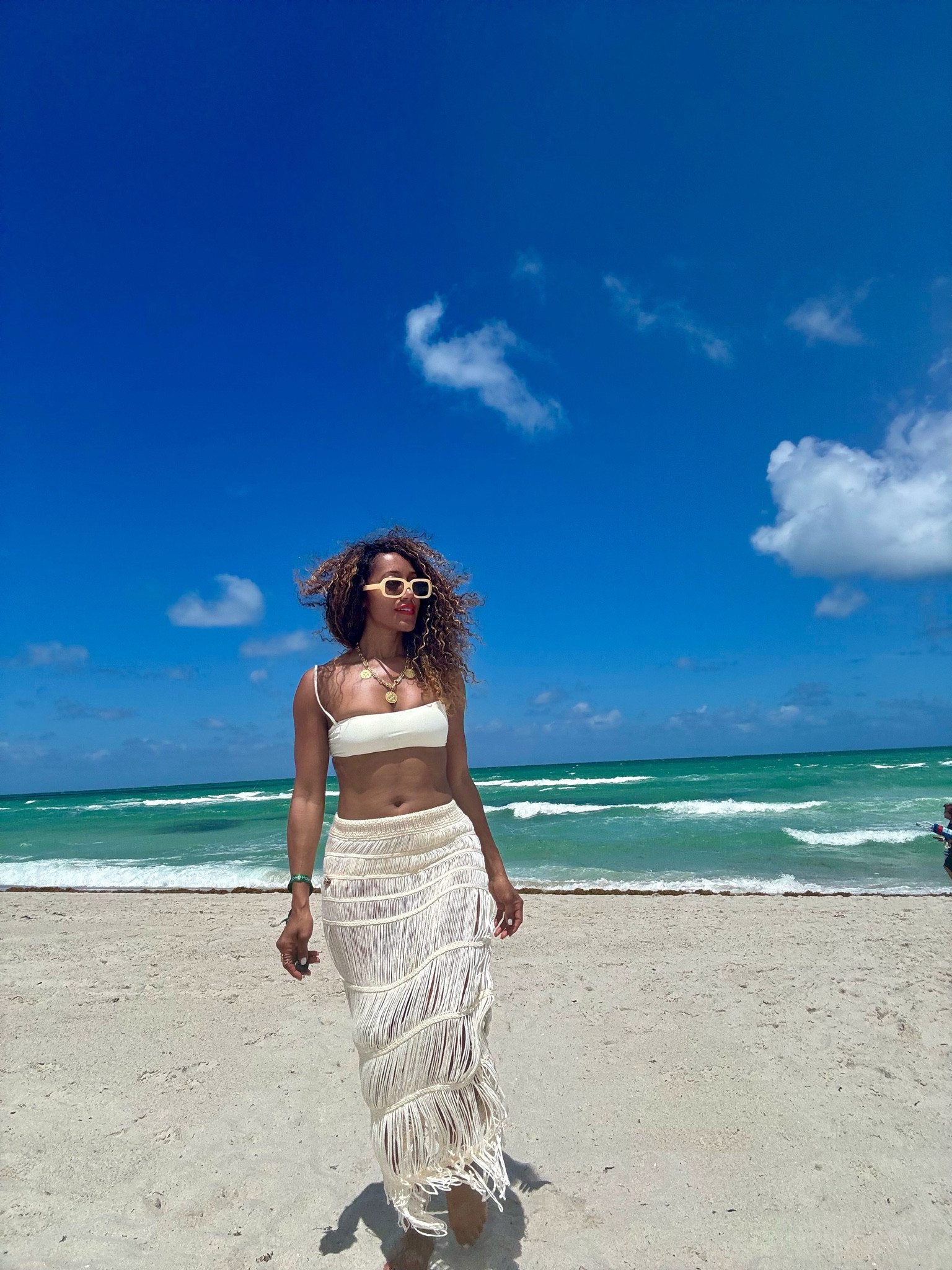 This $16 fringe swimsuit cover-up is one of my fave summer finds so far. 
It runs small. I usually wear a size 4 in other brands. I’m wearing the skirt in an 8 (Medium)  #LTKSummerSales 

#LTKTravel #LTKFindsUnder50