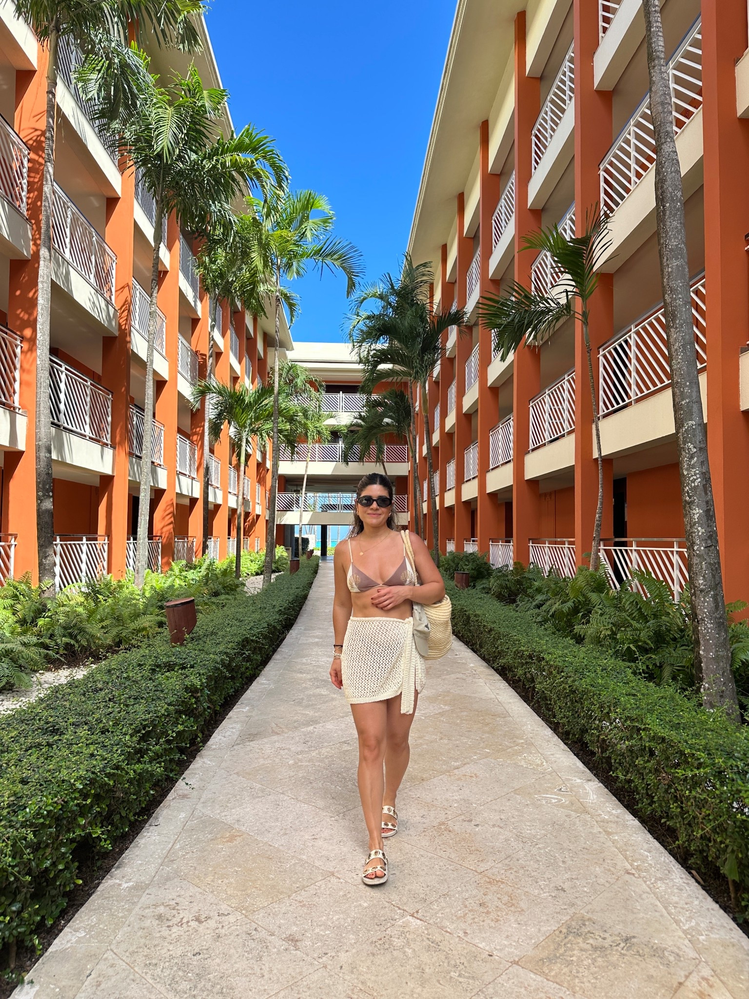 One of my favorite beach looks I wore in Punta Cana! This little cover up is the cutest thing!! Looks so good on and it’s super comfy. This bikini top and bottom are so chic!!! Love the colors.
The bottom is super cheeky, make sure to size up two sizes if you want more coverage. 
Bikini top size small
Bikini bottom size Medium
Coverup size small

#LTKTravel #LTKSeasonal