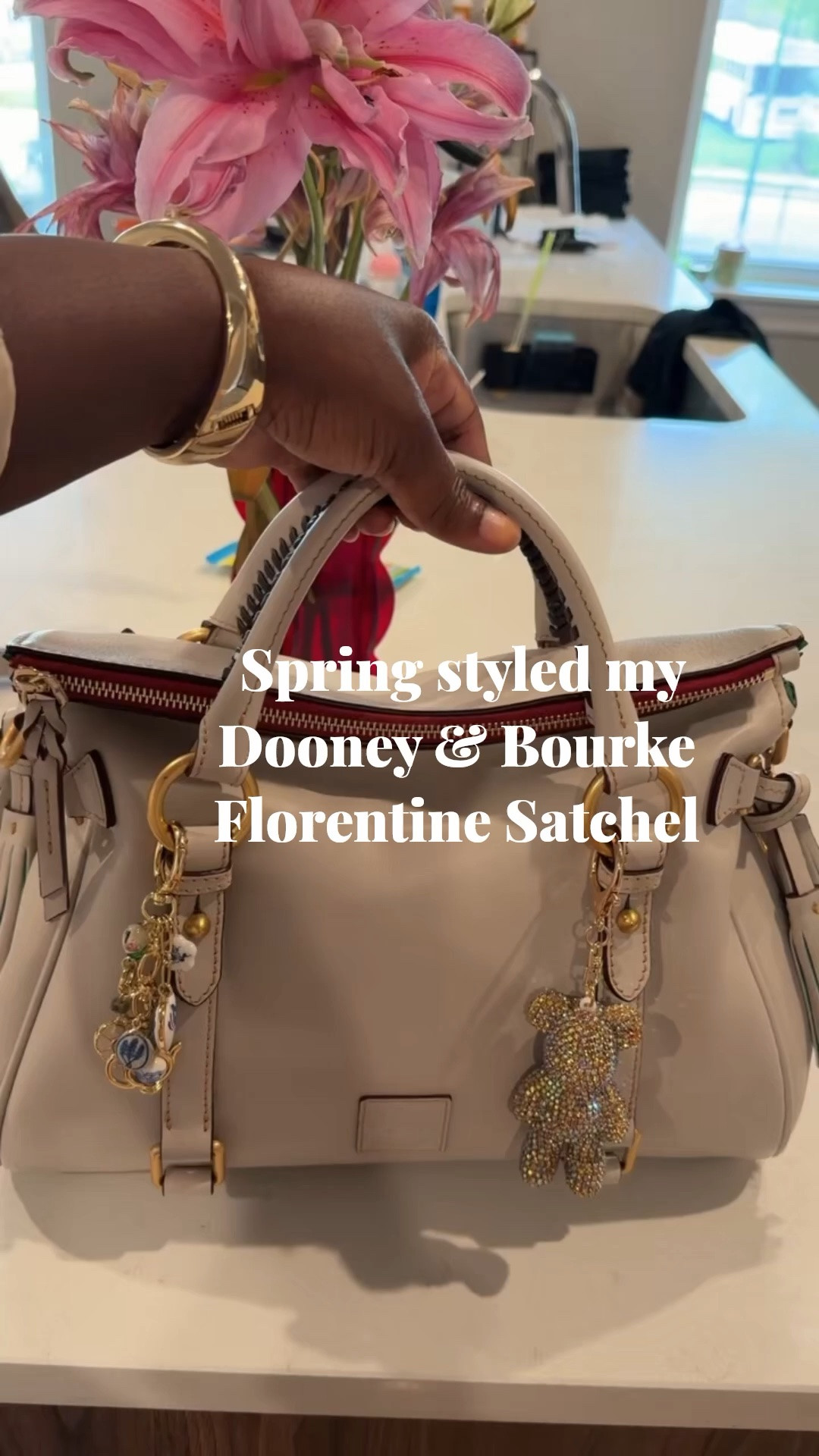 The Dooney & Bourke Florentine Satchel in Ecru is the perfect bag for the spring and goes with all of my outfits. Bag charms are a great way to give your bag personality. 
#ltkbag

#LTKMothersDay