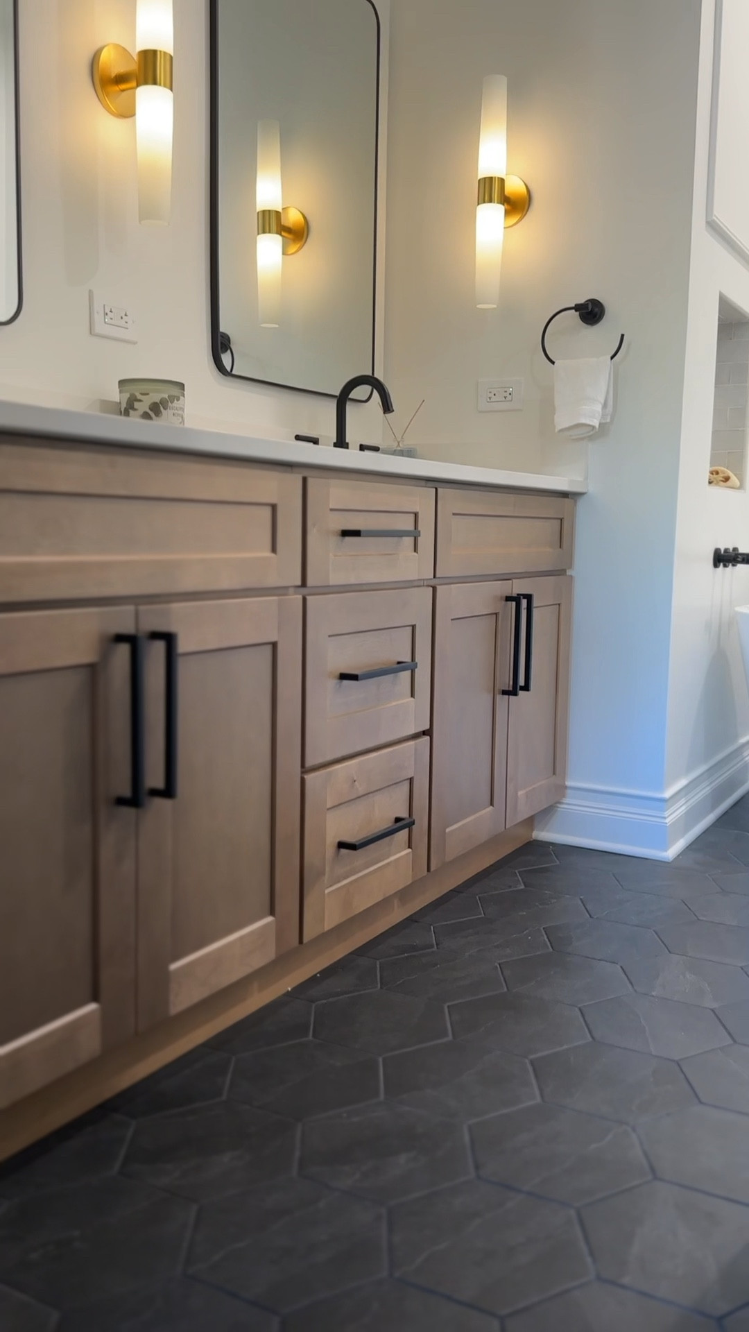 Posting this to list all of the products I used in this bathroom… I really scanned the internet and think I ended up with some pretty good deals! 

Tub - $860
Mirrors - $75
Shower system - $740
Tile - $296 total 
Vanity - $920 

#LTKhome