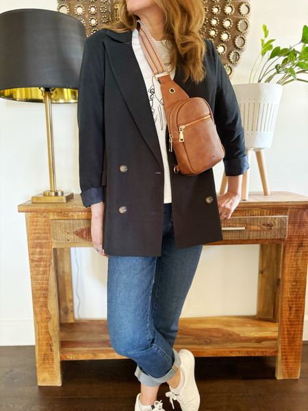 Mom uniform.  Cuffed Madewell jeans and oversized blazer.  Graphic tee ✔️Hands free bag ✔️ White sneaker ✔️

#LTKover40 #LTKfindsunder50 #LTKitbag