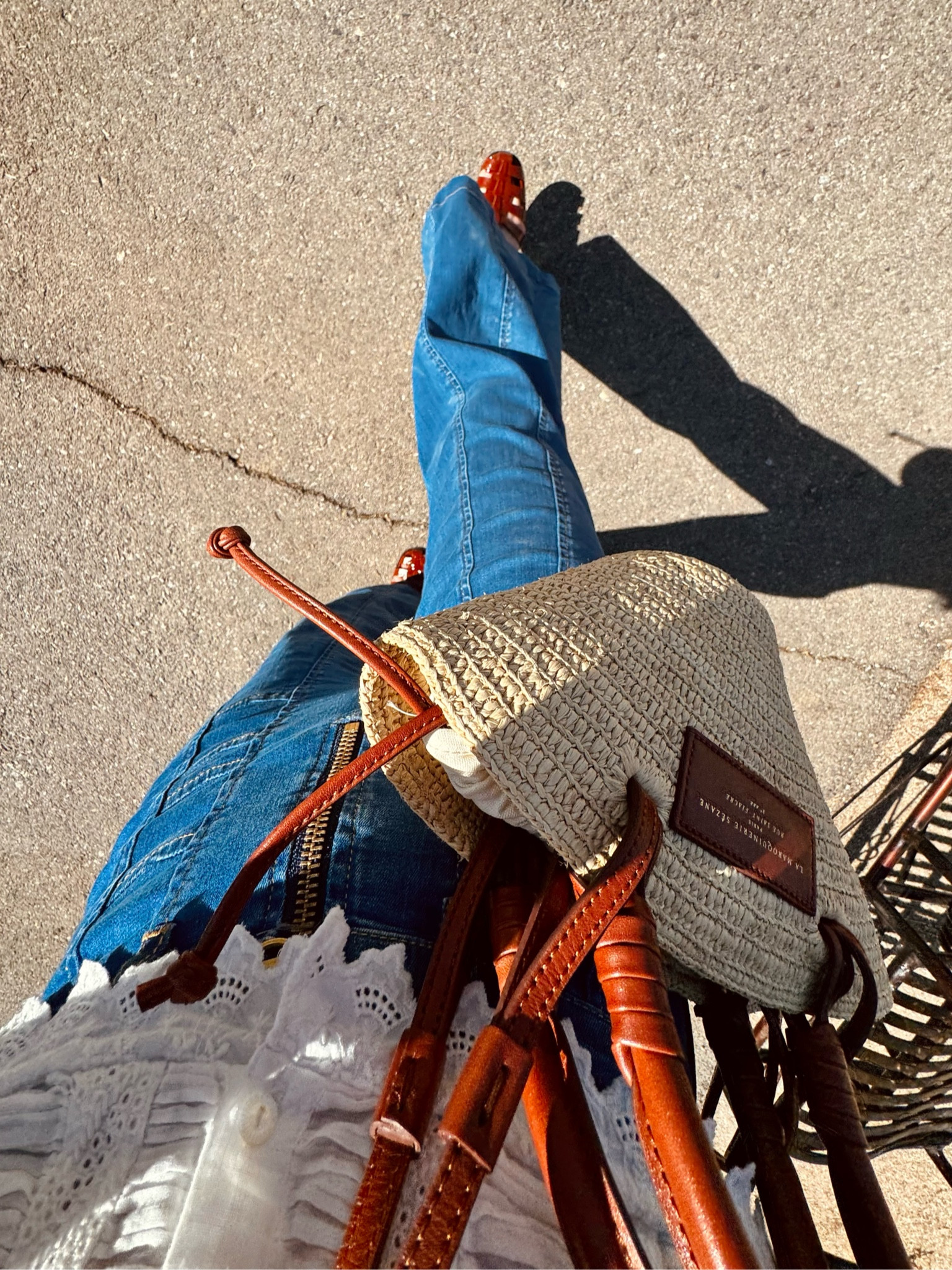 Wide leg denim, white lacey shirt and basket bag: basically my springtime uniform 🙌🤍🧡

#LTKSeasonal