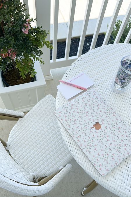 Todays work view! Porch decor, patio furniture 🤍
Floral laptop cover, white wicker bistro set, Serena and lily look for less, faux plants, planter, amazon find 

#LTKfindsunder100 #LTKhome #LTKsalealert