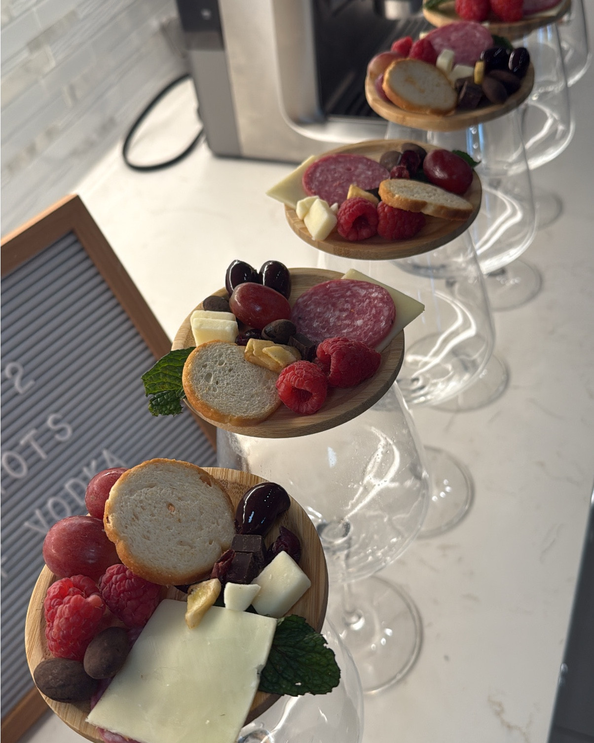 Swipe to see my lazy girl hack to making these!

My lazy way of making charcuterie wine toppers for the holidays. They take five minutes and look like you actually tried — perfect for hosting, girls night, or bringing to any holiday event.

What I used:
Mini wood charcuterie wine glass toppers  (fit on top of most wine glasses).
Hillshire Snacking packs.
Balanced Breaks 3-pack.
Grapes + raspberries.
Skinny Dipped almonds.
Crackers + a little mint for color.

Why I love it: Zero prep. No cutting boards. No mess. Everyone gets their own little board. And it looks so cute with wine glasses on the counter. Total hostess hack.

charcuterie wine topper. wine glass charcuterie. mini charcuterie boards. holiday appetizer ideas. thanksgiving appetizers. christmas appetizers. holiday hosting ideas. easy hosting hacks. girls night snacks. holiday party snacks. mini charcuterie plates. affordable charcuterie. quick appetizer ideas. hosting essentials. amazon hosting finds. ltk holiday hosting. festive snack ideas.

#LTKCyberWeek #LTKHoliday #LTKGiftGuide