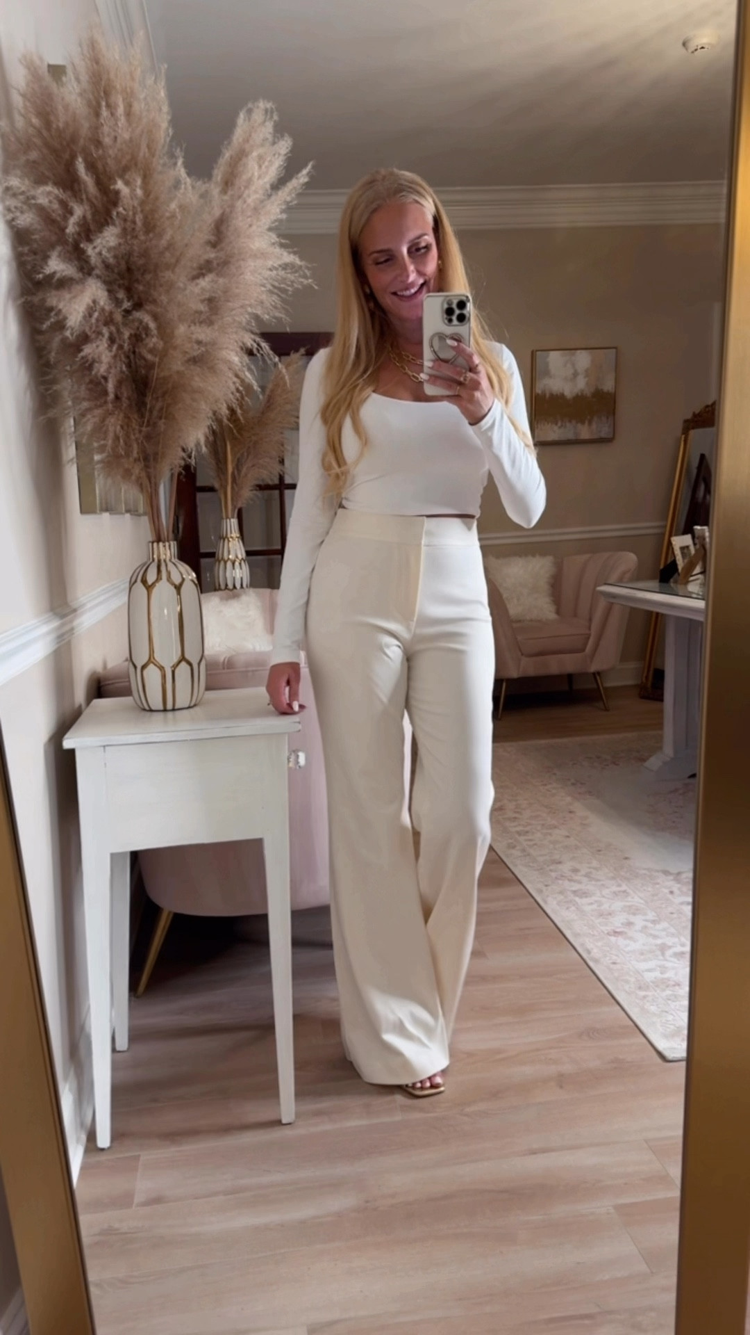 These high rise white flare trouser pants are absolutely gorgeous. Wearing a 6 and could go down to a 4 for a tighter fit. Very flattering!

#LTKStyleTip #LTKSeasonal #LTKOver40