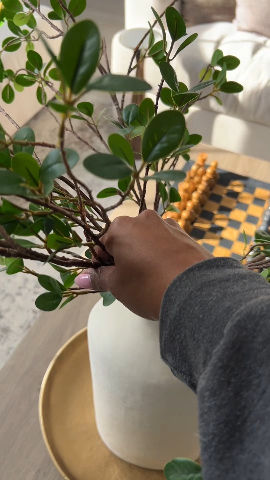 I could feel the room wanting something different.

Taking out the green stems from the cream vase to make space for a new pop of color.

Sometimes the reset starts with removing.

#LTKHome