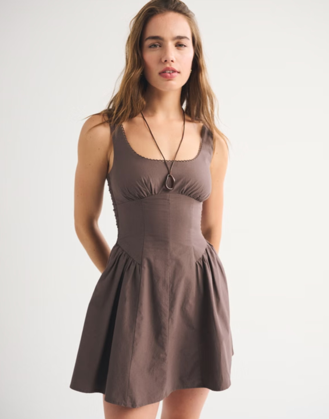 Such a flattering everyday dress 🤍 The Abercrombie Dylan Bra-Free Mini Dress is part of their bra-free collection with built-in support (removable pads!) so you can skip the bra. It features a scoop neckline with delicate picot trim, adjustable straps, back smocking, and a dipped waist that flows into the prettiest skirt. Easy, comfortable, and perfect for throwing on and going ✨ 

 #LTKootd #LTKSaleAlert #LTKTravel