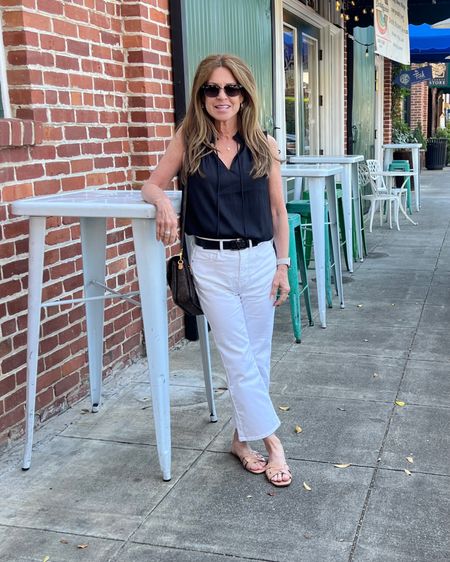 I loved this classic black & white outfit for sightseeing! This black pleated tank is so flattering on and very comfy. Wearing size XS. Paired with white kick crop jeans in size 2P and neutral slides.
#classiclook #womenover50 #capsulewardrobe #springfashion

#LTKFindsUnder50 #LTKStyleTip #LTKSeasonal
