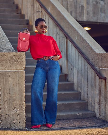 Jeans and a blouse, but make it bold! Paired wide-leg jeans with a bright red blouse and red pumps for an elevated casual look! The blouse is on sale and under $30!
Bag: mytomoli.com

#LTKsalealert #LTKmidsize #LTKfindsunder50