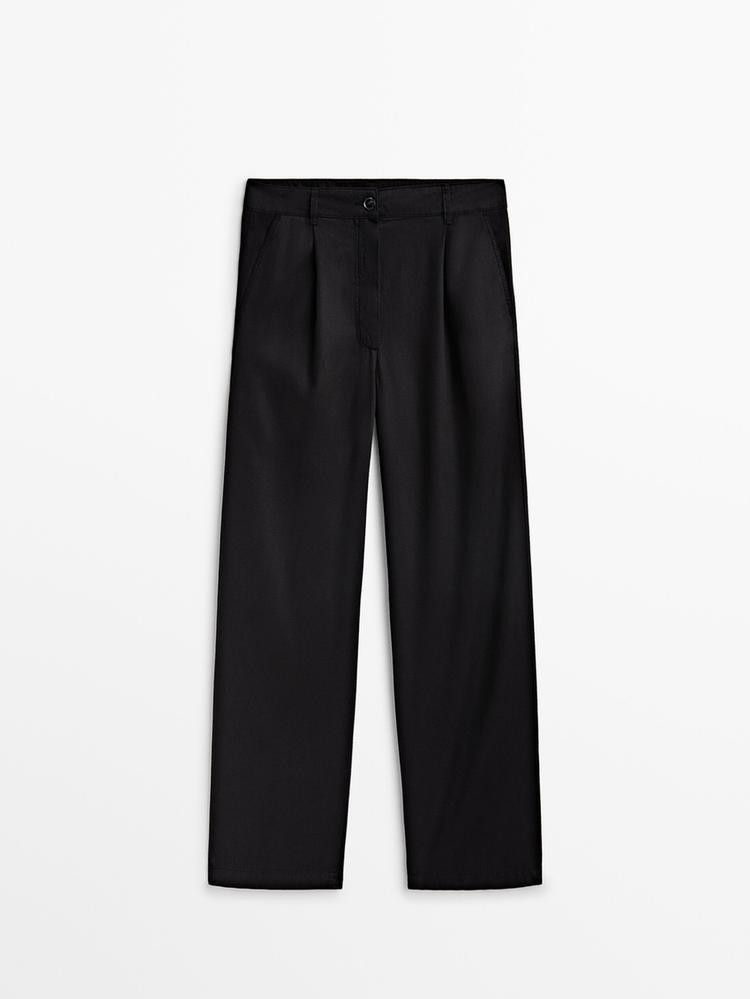 Flowing trousers in a lyocell blend with darts | Massimo Dutti US
