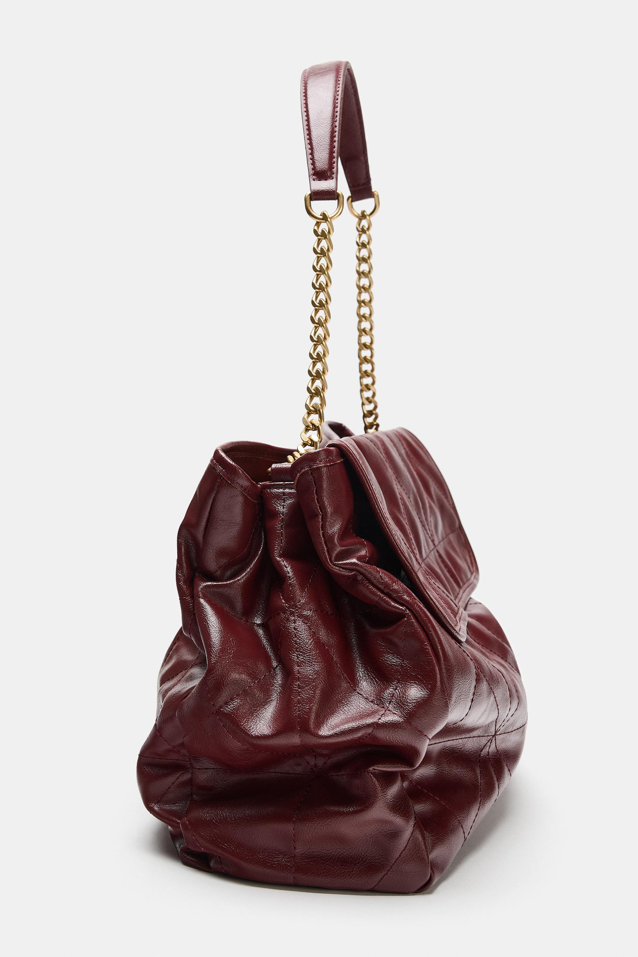 Shopper shoulder bag. Shoulder strap with metal chain in a mix of materials. Interior compartment... | Zara US