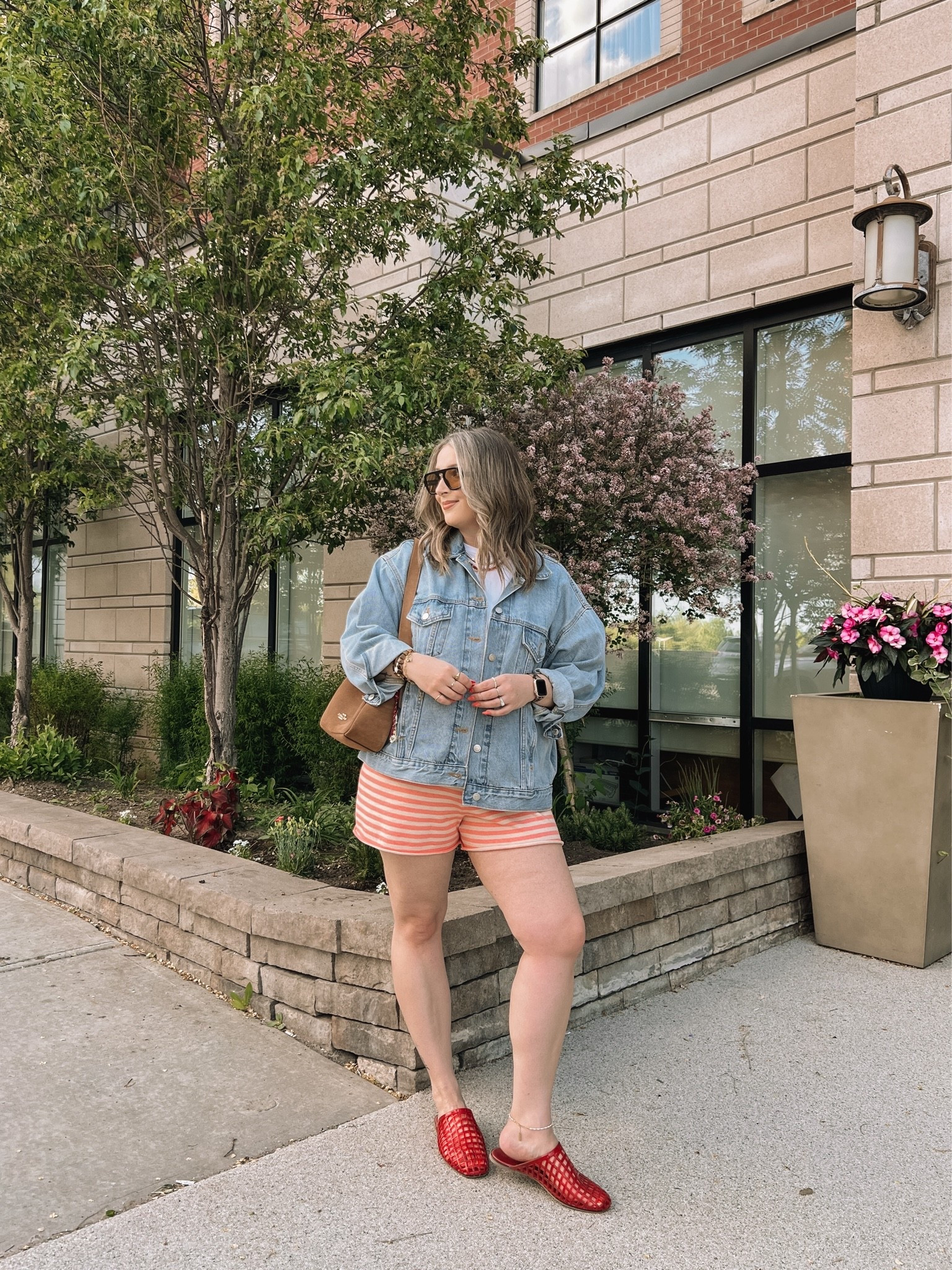 Comfy spring to summer outfit! Wearing my usual L in the striped knit shorts. Sized up to XL in the denim jacket for an oversized fit. Linked similar white tees. Jelly shoes are quite comfy, I’m a 9.5-10 and wear a 10. Canadian shoe link under “similar products”

#LTKsummer #LTKmidsize #LTKstyletip