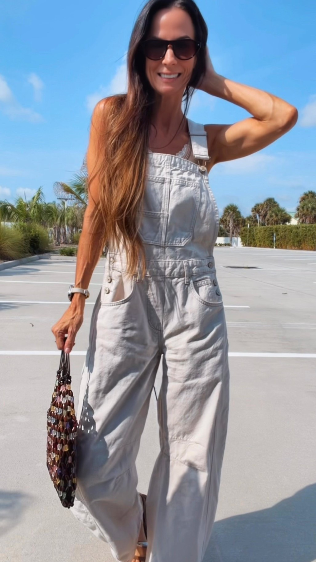 Some outfits just do all the work for you. 🤍

These barrel overalls are giving effortless, and this beaded bag is the little pop that makes the whole look feel extra fun. Throw on a lace tank, comfy sandals, oversized sunnies, and suddenly running errands feels like a fashion moment.

Proof that casual doesn’t have to be boring. ✨

#OOTD #SummerStyle #CasualChic #OverallsStyle #NicoleColeeStyle

#LTKdayinmylife #LTKgrwm #LTKootd