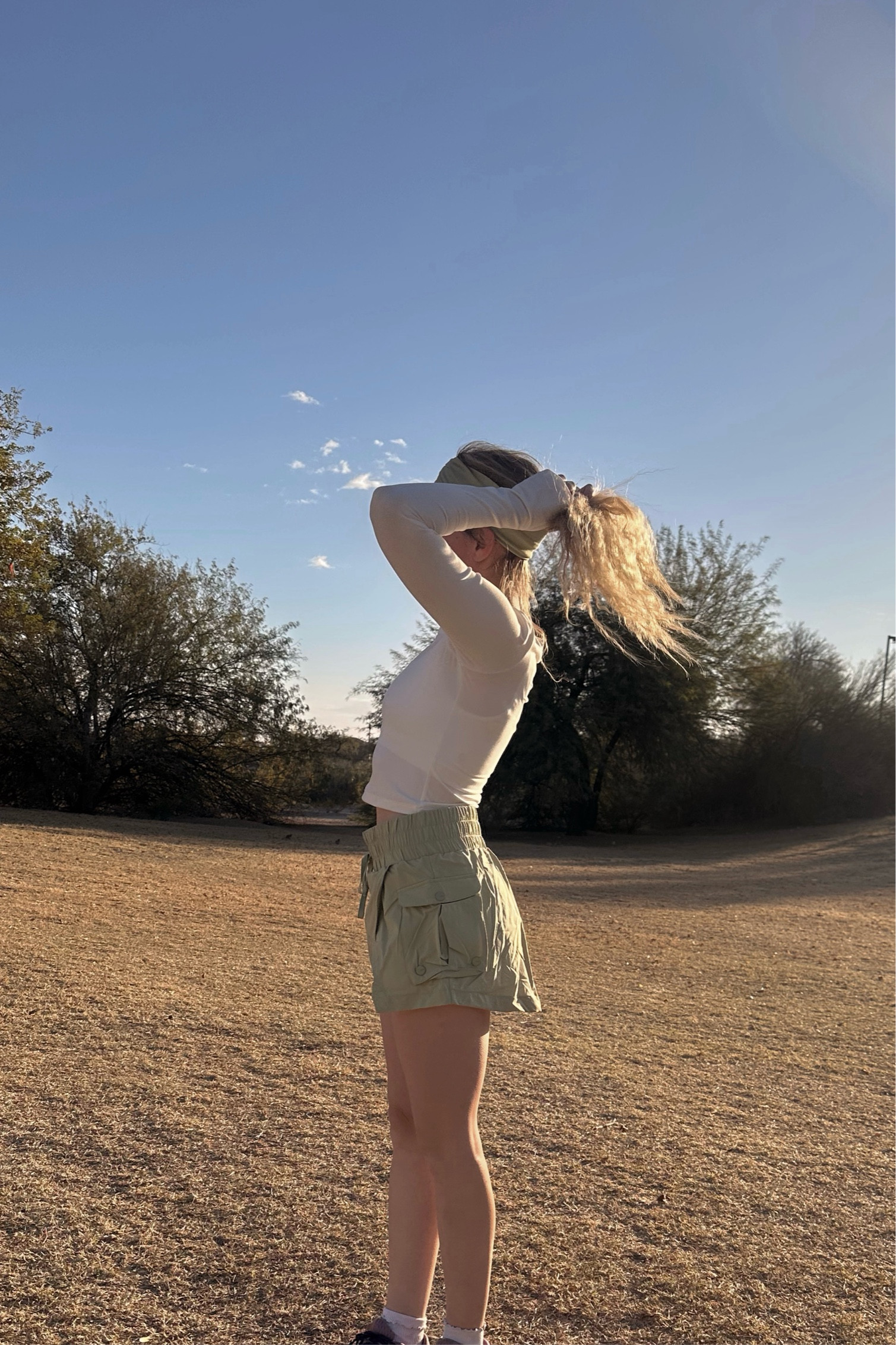 White long sleeve workout top, green skort and ruffle socks for this mom activewear look  from POPFLEX 💚💜

#LTKActive #LTKstyletip #LTKfindsunder100
