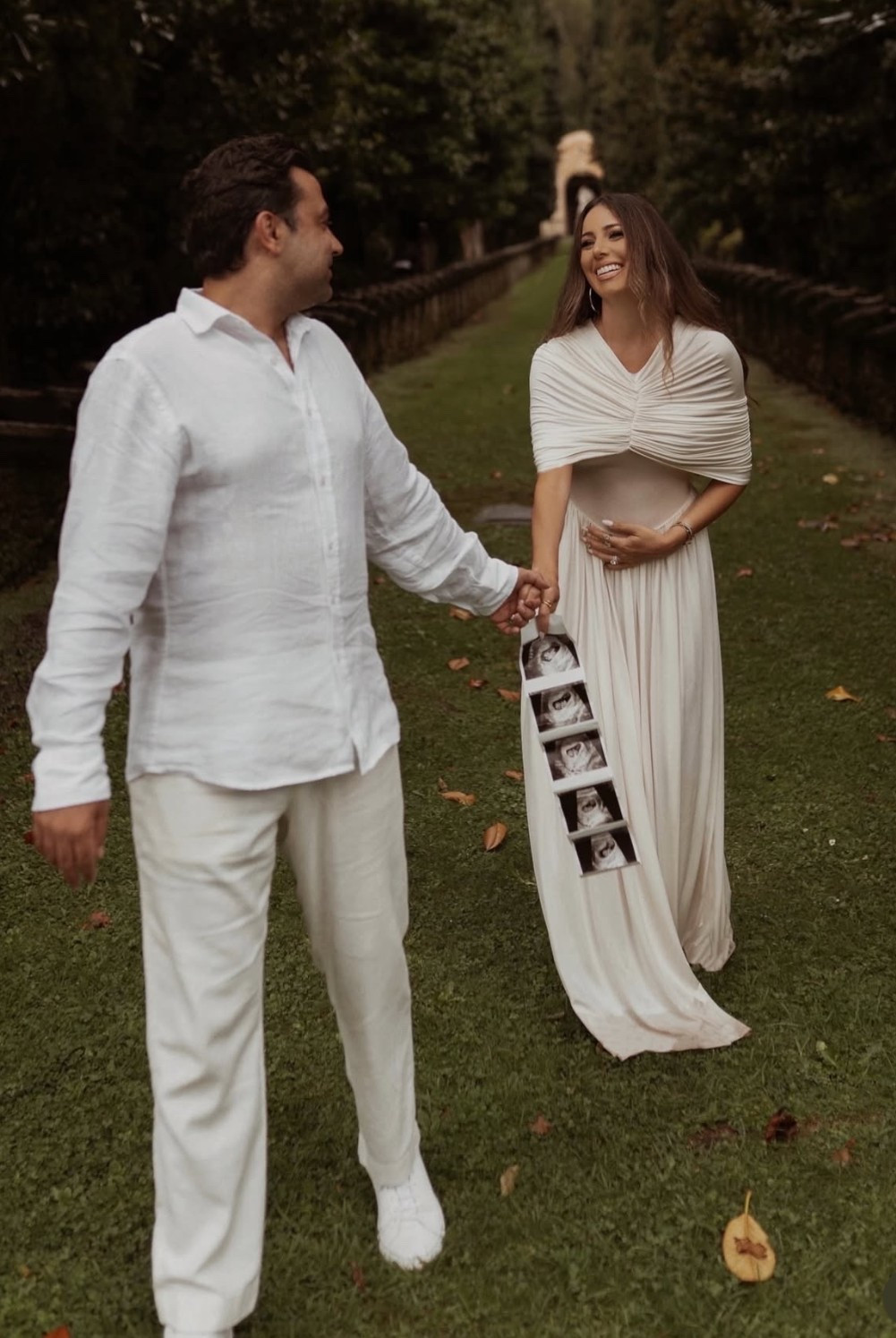 the dress I wore for our pregnancy announcement photos - I wore an XS here, the dress is stretchy so there's definitely
room! ps - the black on major sale!

#LTKStyleTip #LTKSaleAlert #LTKBump