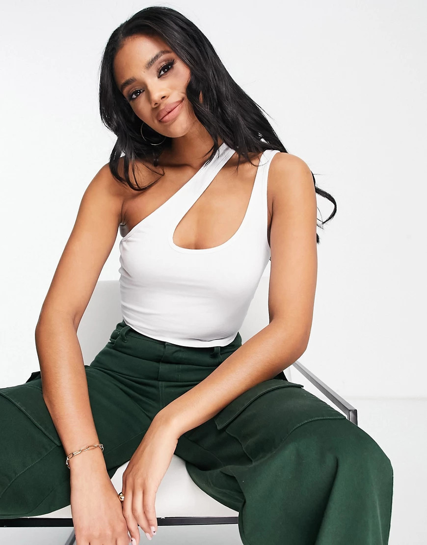 ASOS DESIGN strappy asymmetric cut out crop top in white | ASOS (Global)