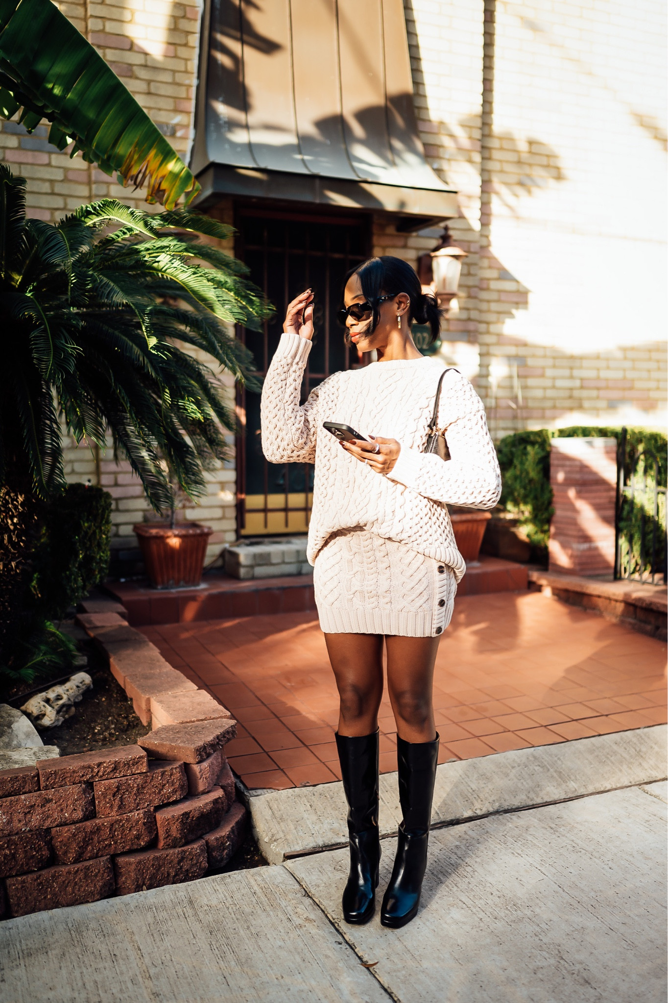 Song of Style two-piece sweater set, black platform boots, Anine Bing bag, Prada sunnies 

#LTKstyletip #LTKGiftGuide #LTKHoliday