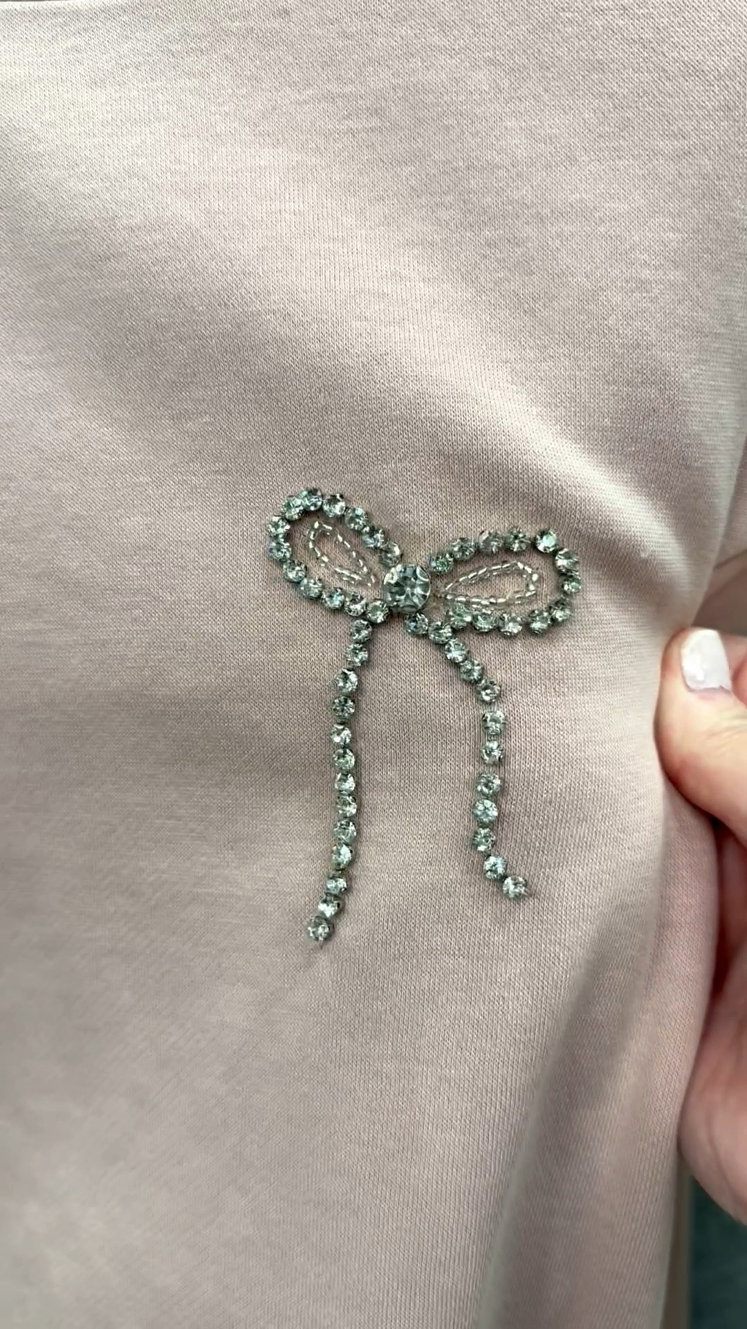 This sweatshirt is adorable, 🎀 and perfect for a low-key NYE look! Wear it with jeans, dressy pants, or a skirt. Very flexible and super cute! It comes in two colors — this is the pink — and has an adorable rhinestone bow. This is a warm one and has fleece lining, round neck and ribbed cuffs and hem.

#bowsweatshirt #dressysweatshirt #newyearseve #NYE #nyeoutfit #nyetop #warmnyetop #bowdetail #Target #anewday #rhinestonebow #newyearsevepartylook

#LTKootd #LTKFindsUnder50 #LTKHoliday