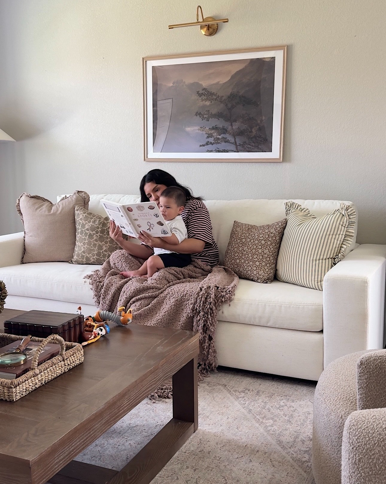 Slow mornings at home mean reading with my toddler, toy filled cushions, and coffee in hand! 

One thing I love most is having a space where we can all gather, play, and unwind together. We’ve been loving our barton sofa from @albanyparkhome for everything from quiet morning moments to toddler playtime.

Comfortable, family-friendly, and beautiful enough to make our living room feel complete.
 
comment “shop” and i’ll send you the link! 🤍 
 #MyAlbanyPark #AlbanyParkHome #momentsathome #cozyhome #livingroominspo