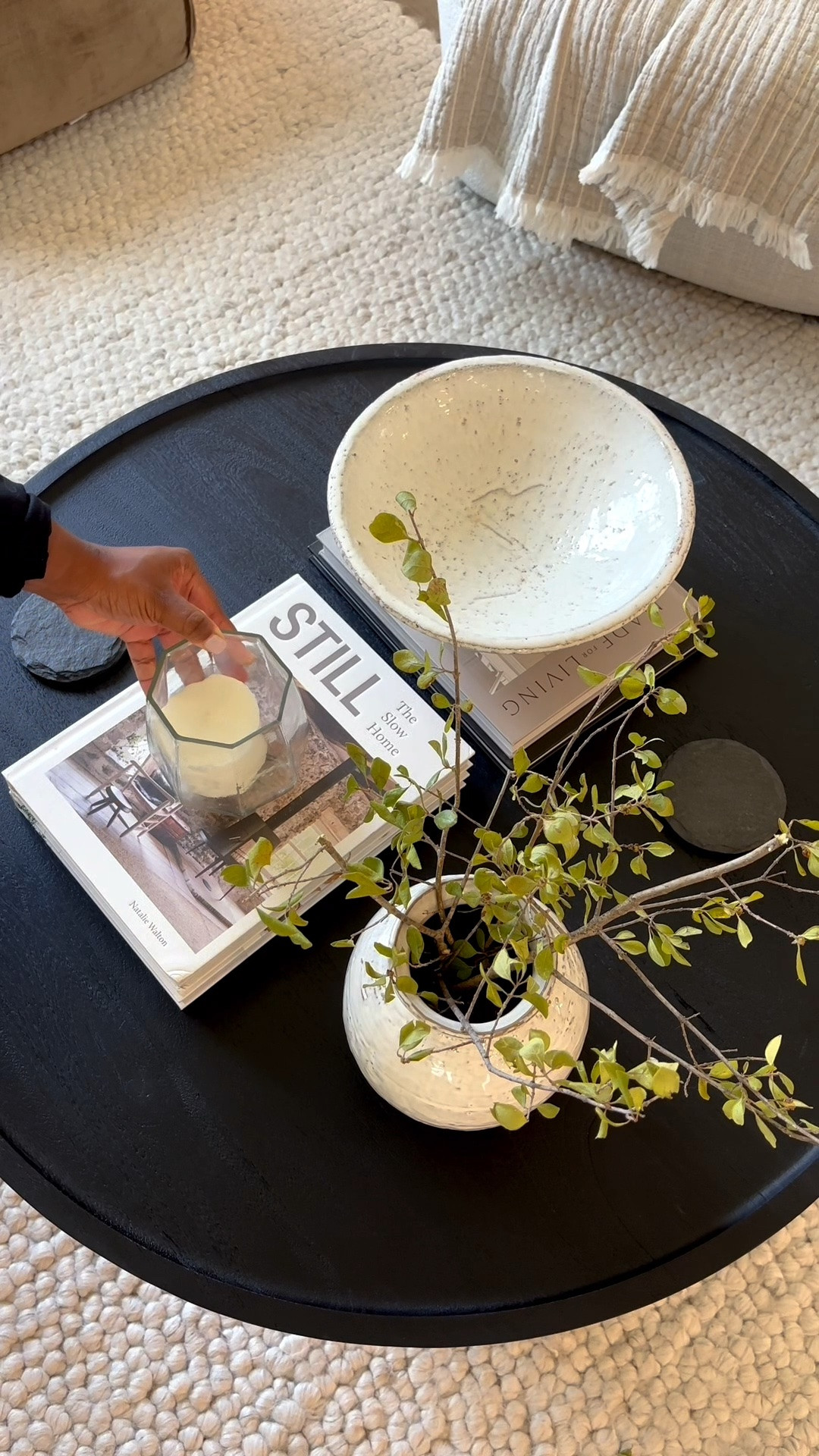 Decorating my small round coffee table! 

Coffee table decor, glass hurricanes, black wood table

#LTKSaleAlert #LTKHome