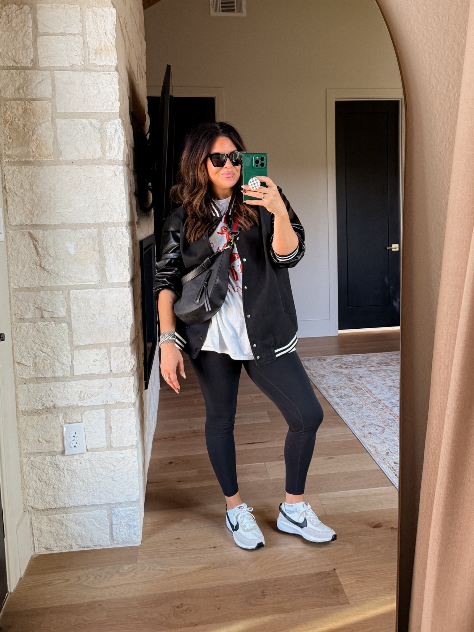 Leggings aren’t boring! Ya just need fun layers!  LOVE ME A VARSITY JACKET!
Varsity Jacket: XL
Graphic Tee: XXL
Favorite Amazon Leggings: Large
Sneakers: I got my true size 8.5 but they are snug. Maybe size up 1/2 size. 

Midsize outfits, midsize style, leggings outfit, sports mom outfit, casual leggings style, fall outfits 

#LTKFindsUnder50 #LTKMidsize #LTKSaleAlert