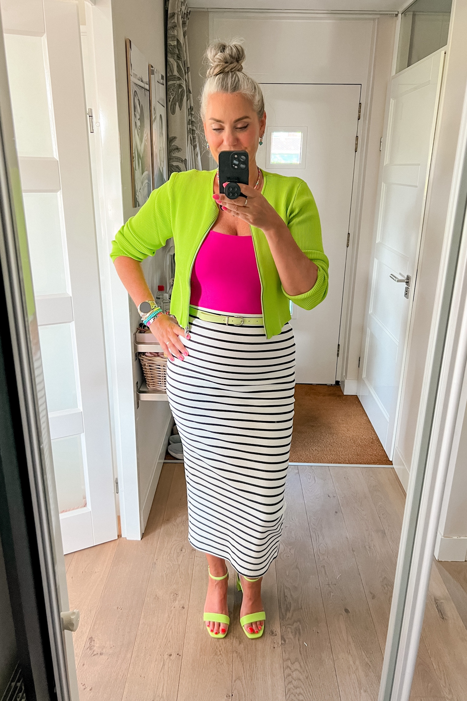Ootd - Wednesday. Chartreuse cropped cardigan over a hot pink top paired with a striped midi skirt and neon heeled sandals and belt. 



#LTKsummer #LTKeurope #LTKnederlands