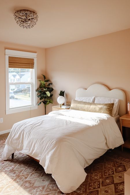 Pre-teen room, scallop headboard, pink and beige rug, woven blinds, light wood nightstand 

#LTKkids #LTKfamily #LTKhome