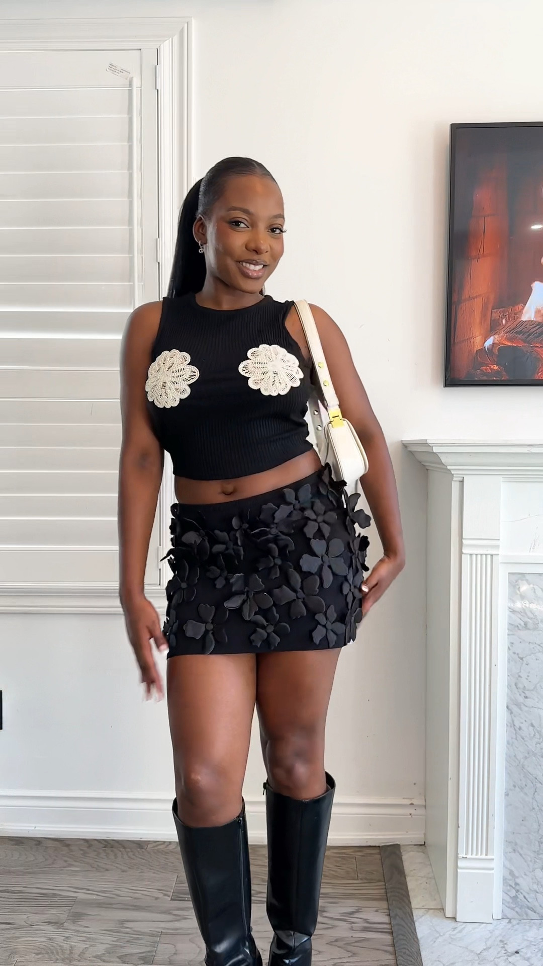 Black mini skirt, black tank top, black knee high boots 

#LTKcanada #LTKfall #LTKdatenight