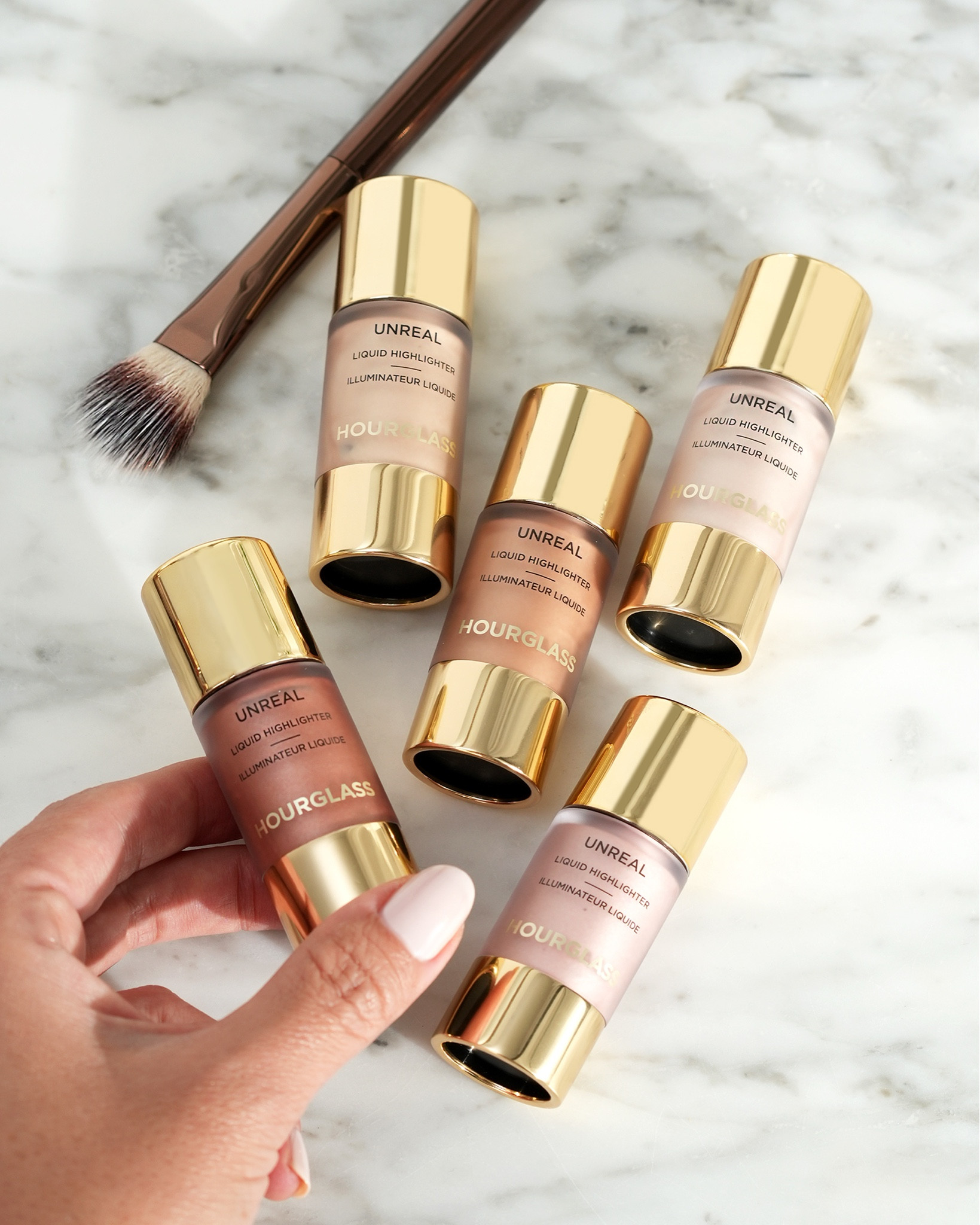 The prettiest radiant glow with the new @hourglasscosmetics Unreal Liquid Highlighters! Swatching these liquid shimmers so you don't have to! Swipe for looks paired with some blush shades. Love the new No 16 Highlighter Brush for precise application.

#LTKBeauty