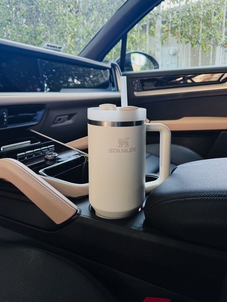 Loving my new Stanley quencher! Fits perfectly in my cup holder - I got the cream color. I like drinking out of a straw but you can turn the top to drink out of the opening and turn it again to close it so there’s no spills. Comes in 30 different colors!  Keeps my drinks cold all day! 
@stanley #stanleypartner 

#LTKfitness #LTKActive #LTKhome