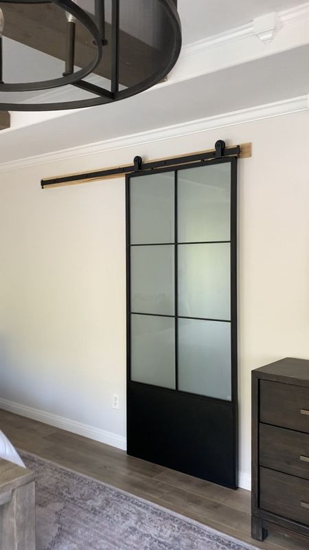 My black metal sliding door is back in stock! Amazing modern look for a super low price. Tip: great solution for separation between master bedroom and bathroom! Comes with track 👍
Sliding barn door. Sliding door. Steel door. Glass door. Metal door. Black door. 
#lowes 


#LTKstyletip #LTKFind #LTKhome