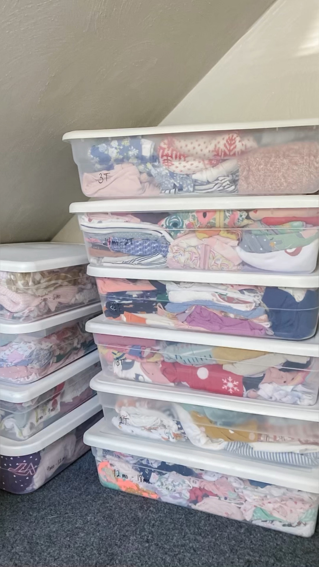I’ve tried every way to organize the girls’ clothes and these under the bed storage bins have been what works best for me!

Those vacuum seal bags are just so hard to get in and out of. I love the ability to easily open up these bins, add or remove clothing, and simply put the top back on and add back to the bin stack. 😆

AND you can use my Sharpie labeling hack on clear plastic to write the sizes on the side of the bins. If you color over the Sharpie with black dry erase marker and wipe with a tissue, the Sharpie comes right off! 👏🏼

#LTKbaby #LTKfamily #LTKhome