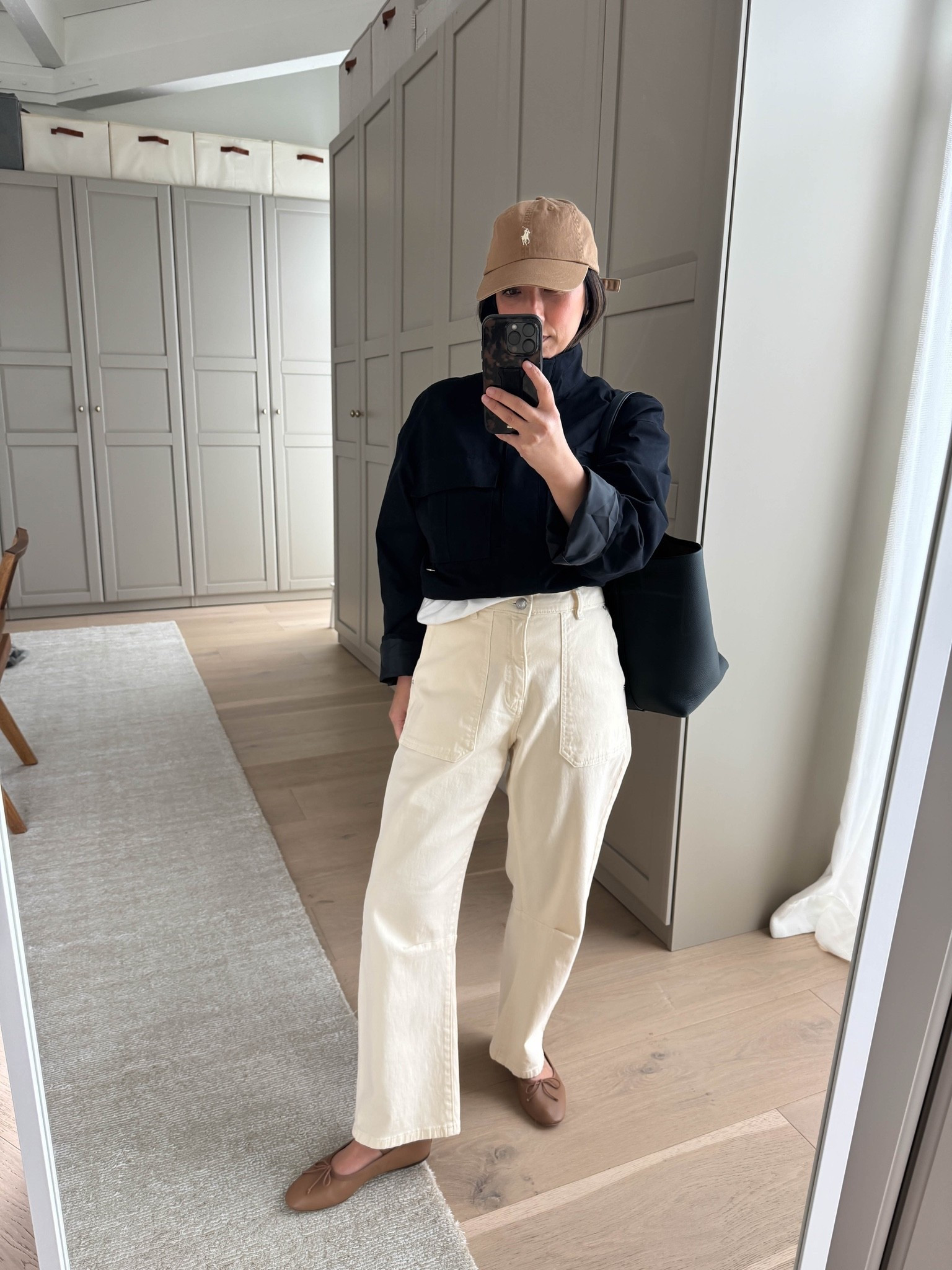 Another outfit formula that works every time - cropped jacket and a barrel pant. This jacket is such a great cropped option and these pants are incredible. So soft and flattering. 

Madewell tee xs
Zara jacket xs - color is a deep navy but could pass for black
DL1961 Billie pants 25 - could take the 24
Loeffler Randall flats 5
The Row bag medium in navy
Polo Ralph Lauren hat
Quince earrings

#LTKootd #LTKmomlife #LTKPetite