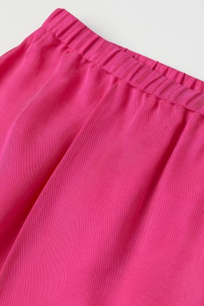 Calf-length skirt in soft lyocell twill. Regular waist, waistband with covered elastic, and a sew... | H&M (US + CA)